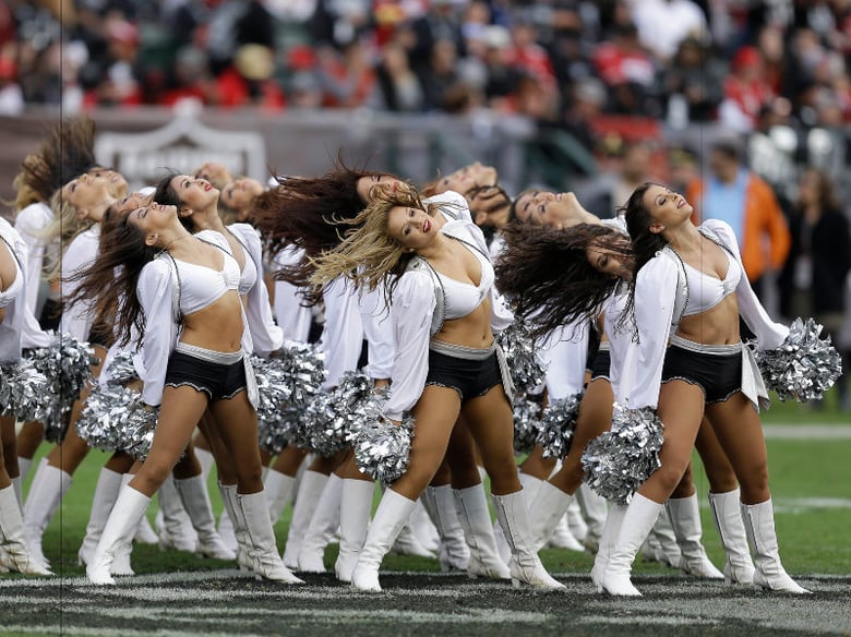 Oakland Raiders cheerleaders perform during the second half of an NFL football game between the Oakland Raiders and the San Francisco 49ers in Oakland, Calif., Sunday, Dec. 7, 2014.